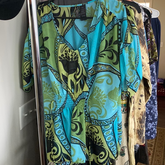 Shear colorful blouse with waist tie in front and back. - Picture 3 of 3